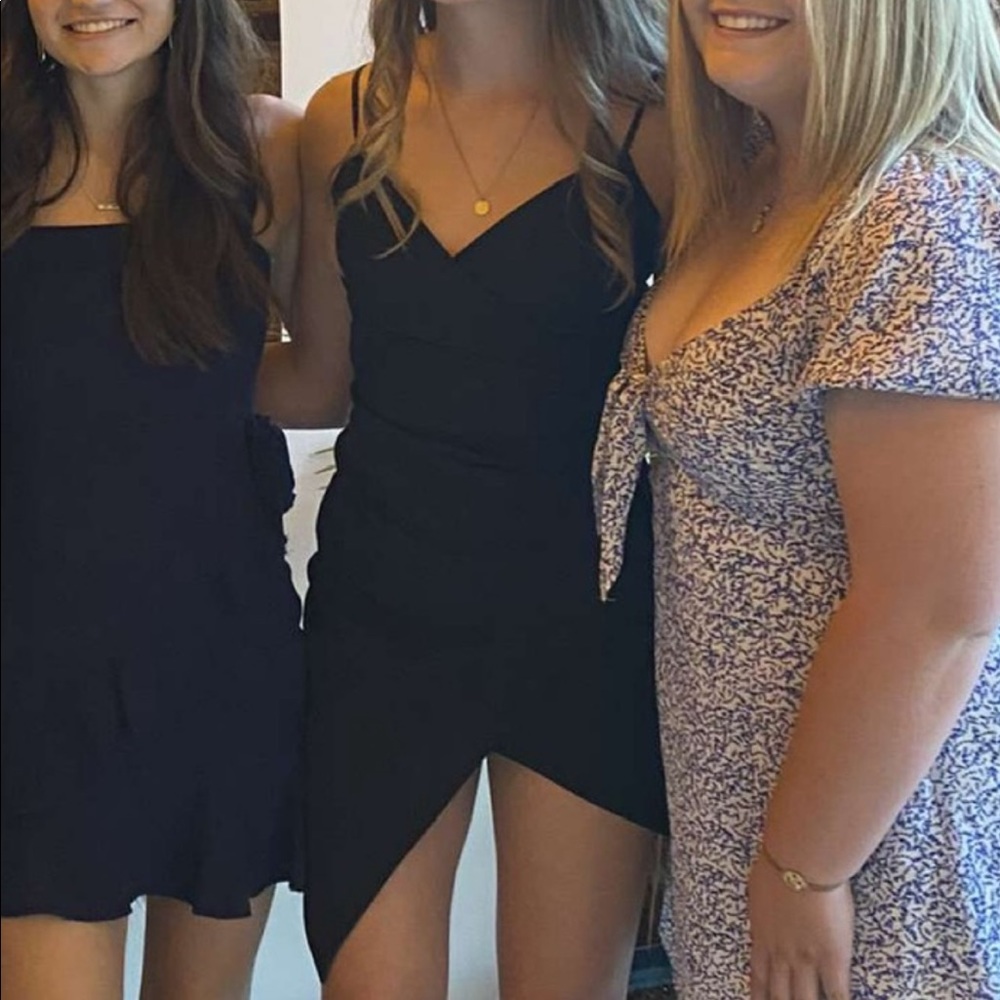 Honey and Rosie SMALL black asymmetrical leg short dress